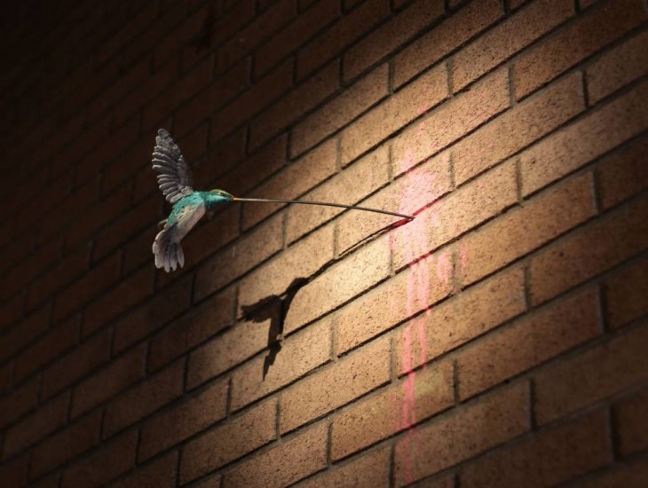 colibri alimentandose de pared de ladrillo en dismaland