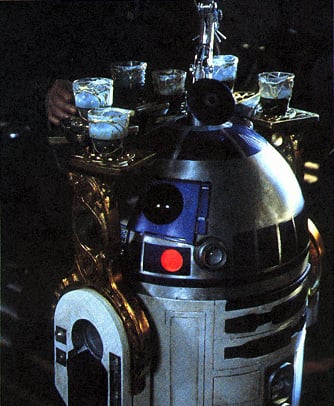 R2-D2 sirviendo tragos con Jabba the Hutt