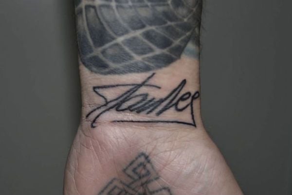 Firma de Stan Lee tatuada