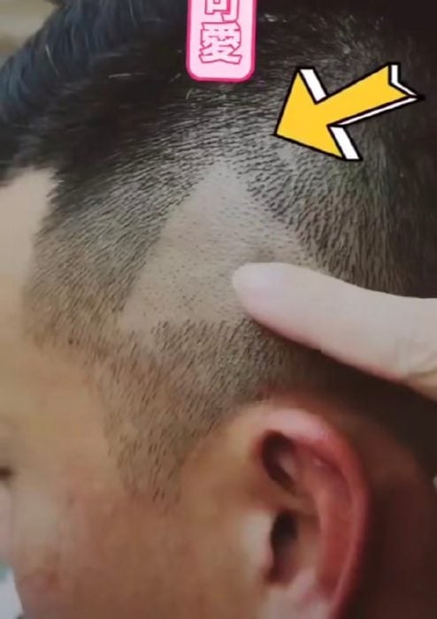 corte de cabello con botón