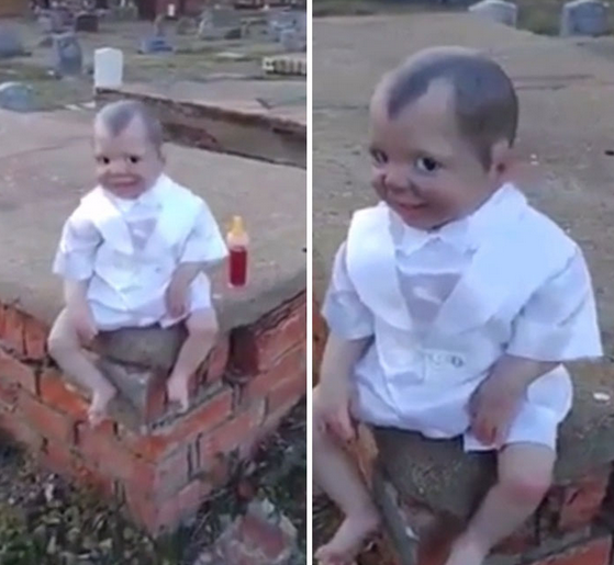 muñeco de Bebé en cementerio 