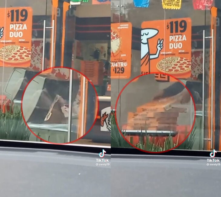 Empleado de Little Caesars saca caja del bote de basura