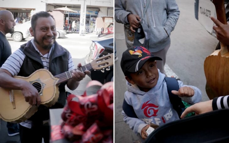 Músico callejero acompañado de su hijo