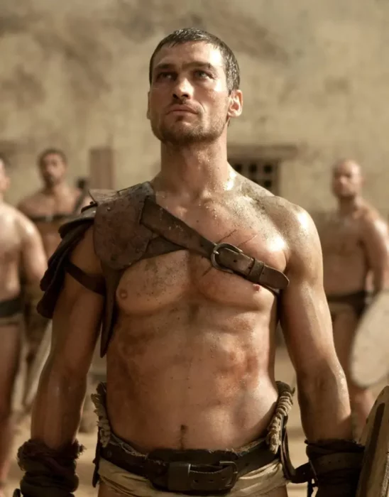 Andy Withfield como Espartaco gladiador