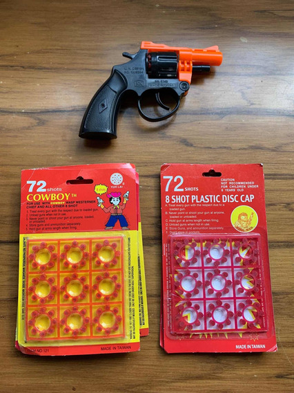 Pistola de juguete con balas de plástico